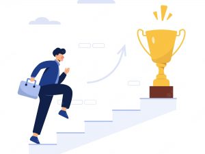 successful-business-man-with-trophy_1150-35038